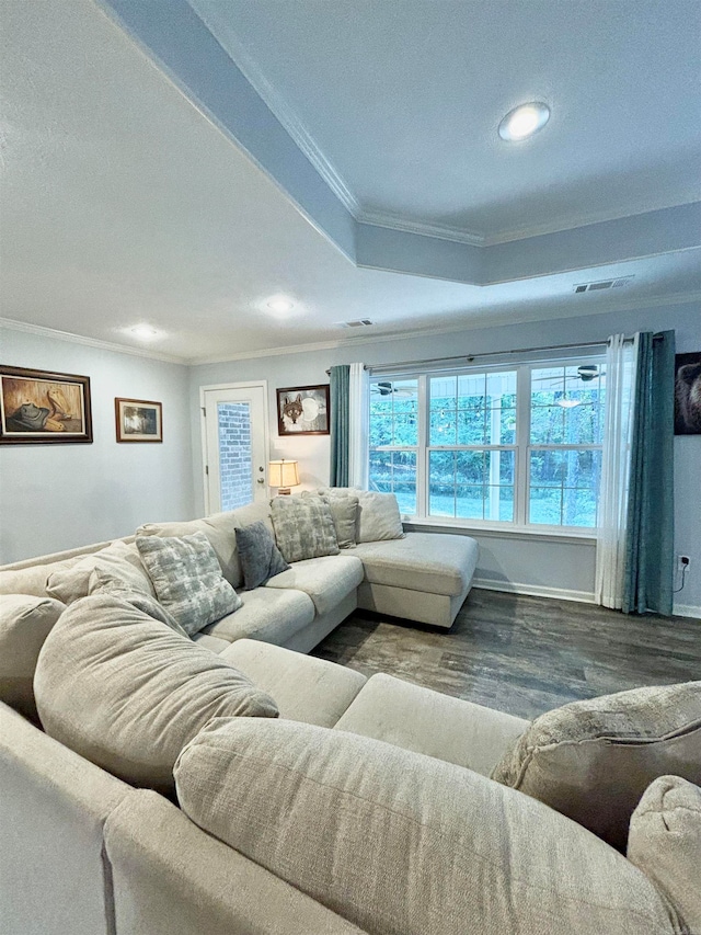 living room featuring ornamental molding and wood-type flooring