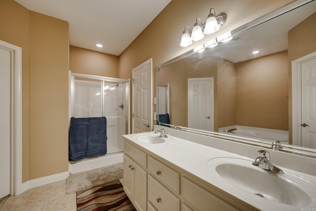 bathroom with tile patterned flooring, vanity, and plus walk in shower