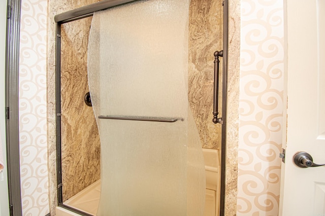 bathroom with a stall shower