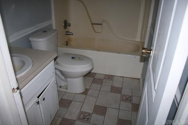 full bathroom with tile patterned flooring, shower / bathtub combination, vanity, and toilet