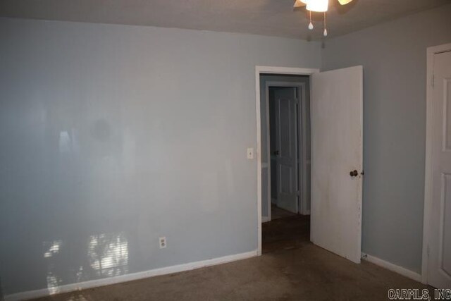 unfurnished room with carpet floors and ceiling fan