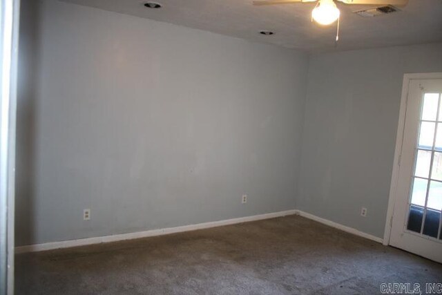 empty room with carpet floors and ceiling fan