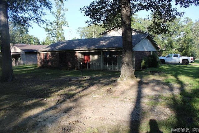 view of front of home with a front yard