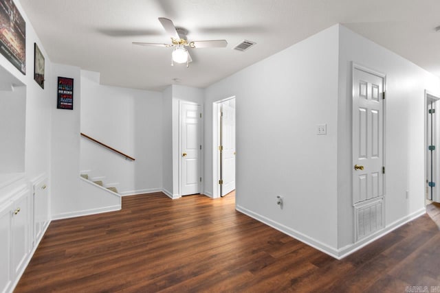 hallway with dark wood-type flooring