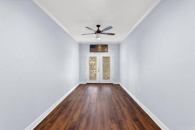 spare room featuring dark wood-type flooring, ceiling fan, french doors, and crown molding