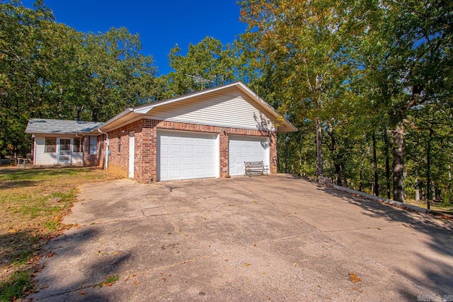 view of home's exterior with a garage