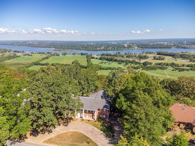 drone / aerial view featuring a rural view and a water view