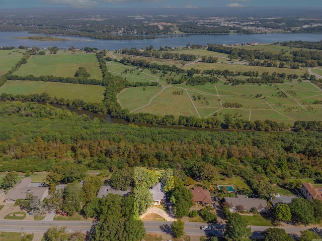 birds eye view of property with a rural view and a water view