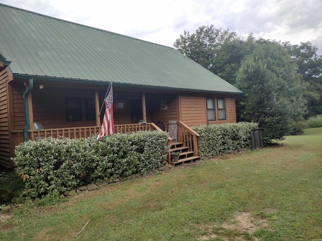 exterior space featuring a lawn