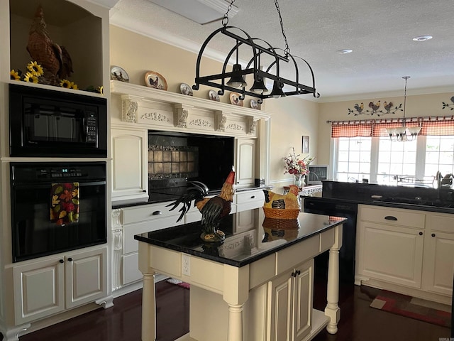 kitchen featuring black appliances, a textured ceiling, crown molding, and sink