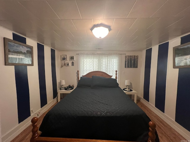 bedroom featuring hardwood / wood-style floors