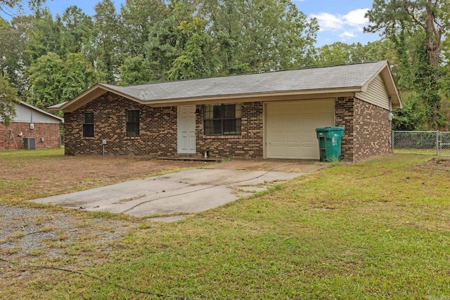 ranch-style house with a garage and a front yard