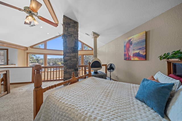 bedroom featuring carpet flooring, vaulted ceiling, ceiling fan, and ornate columns