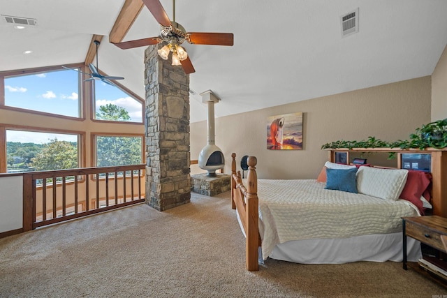 carpeted bedroom featuring high vaulted ceiling, decorative columns, ceiling fan, and beamed ceiling