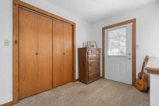 entryway with light carpet