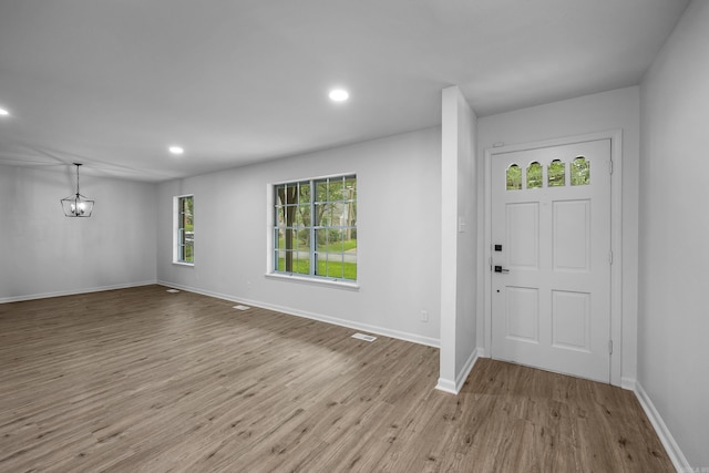 entryway featuring light hardwood / wood-style floors and plenty of natural light