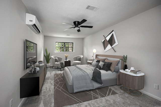 bedroom with ceiling fan, a textured ceiling, a wall mounted air conditioner, and dark colored carpet