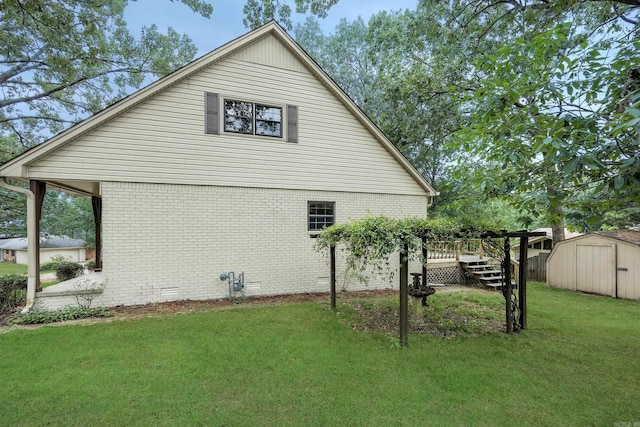 view of side of home featuring a storage shed and a yard