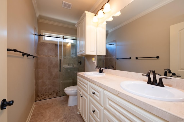 bathroom featuring ornamental molding, a shower with shower door, vanity, and toilet