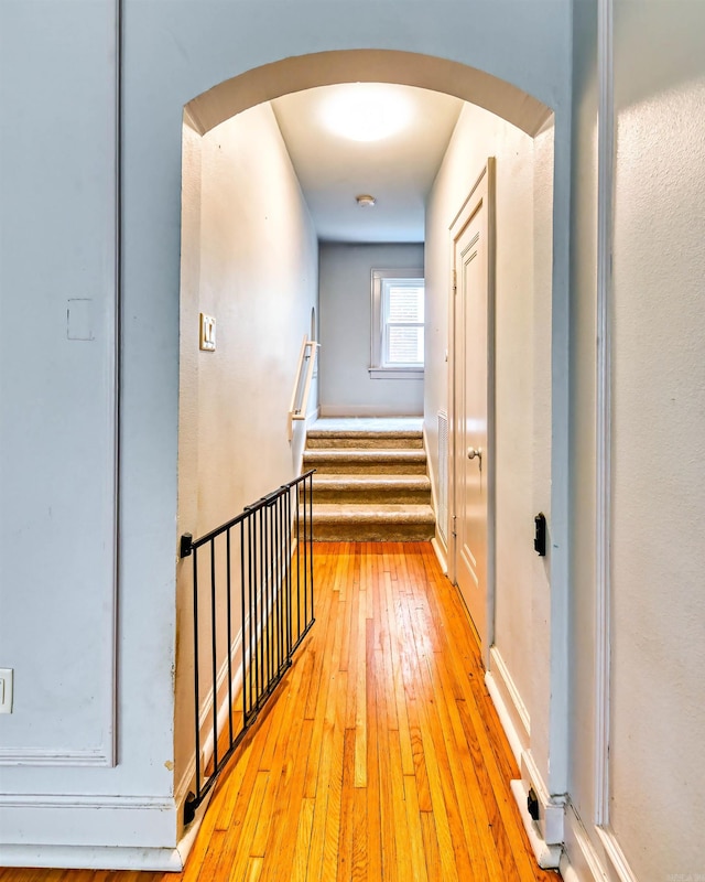 hallway with light wood-type flooring