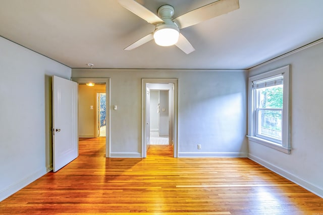 unfurnished bedroom featuring light hardwood / wood-style floors and ceiling fan