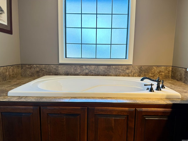 bathroom with a tub