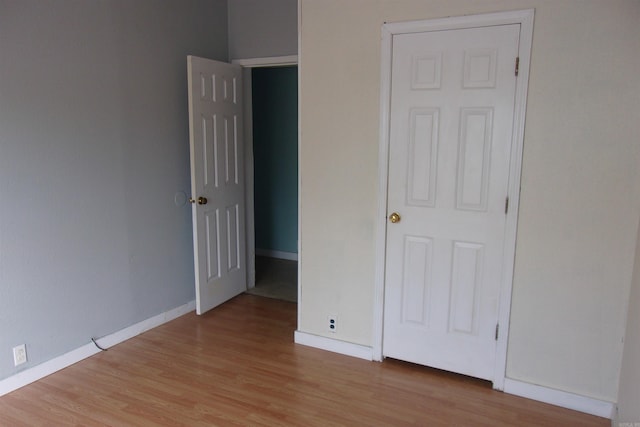 unfurnished bedroom featuring light hardwood / wood-style flooring