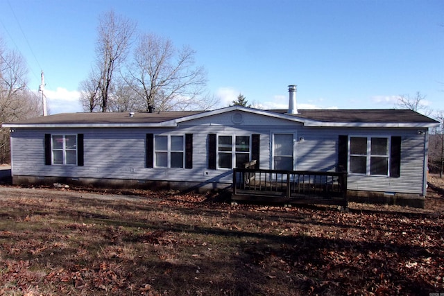 rear view of house with a deck