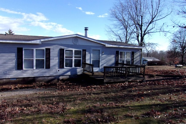 view of front of house featuring a wooden deck