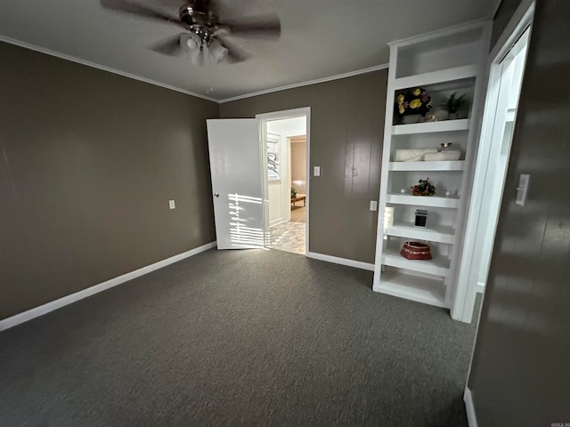 unfurnished bedroom featuring ornamental molding, carpet, and ceiling fan