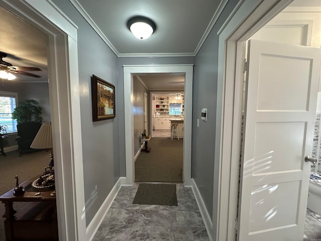 corridor with crown molding