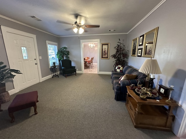 living area with baseboards, ornamental molding, a ceiling fan, and carpet flooring
