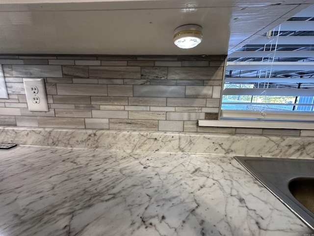 interior details featuring backsplash