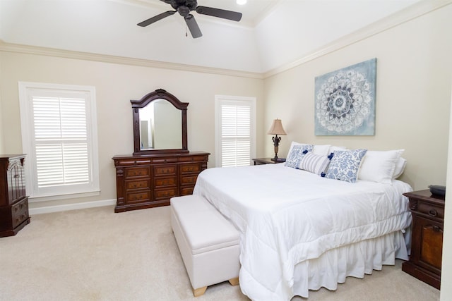 bedroom featuring ceiling fan, light carpet, and ornamental molding