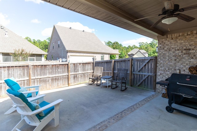 view of patio featuring ceiling fan