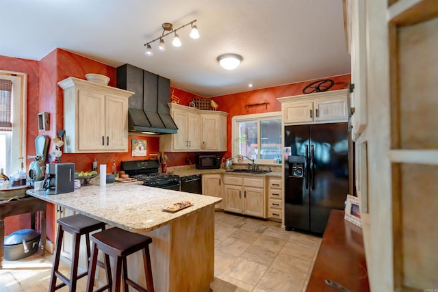 6 Aviation Way, Heber Springs, AR 72543 - kitchen featuring a peninsula, light brown cabinetry, black appliances, a sink, and custom range hood