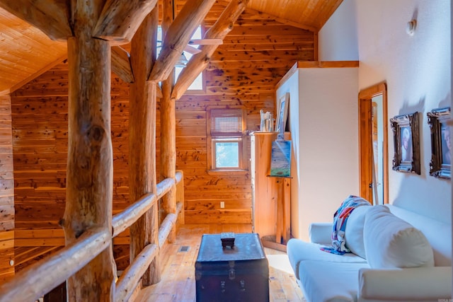 6 Aviation Way, Heber Springs, AR 72543 - sitting room featuring wood walls, high vaulted ceiling, wooden ceiling, and hardwood / wood-style floors