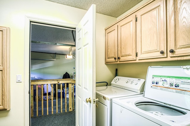 laundry area featuring carpet flooring, a textured ceiling, cabinets, and separate washer and dryer