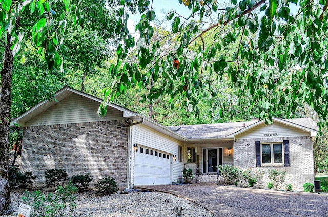 ranch-style home with a garage