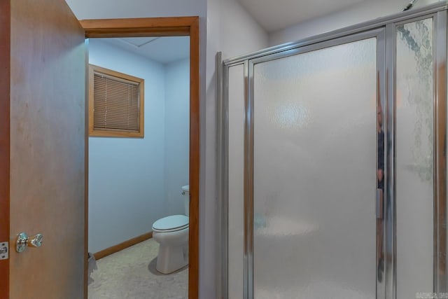 bathroom with walk in shower and toilet