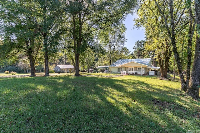 view of yard with a porch