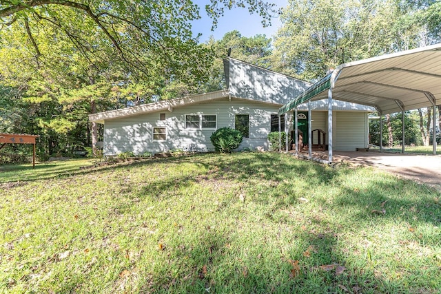 exterior space featuring a yard and a carport