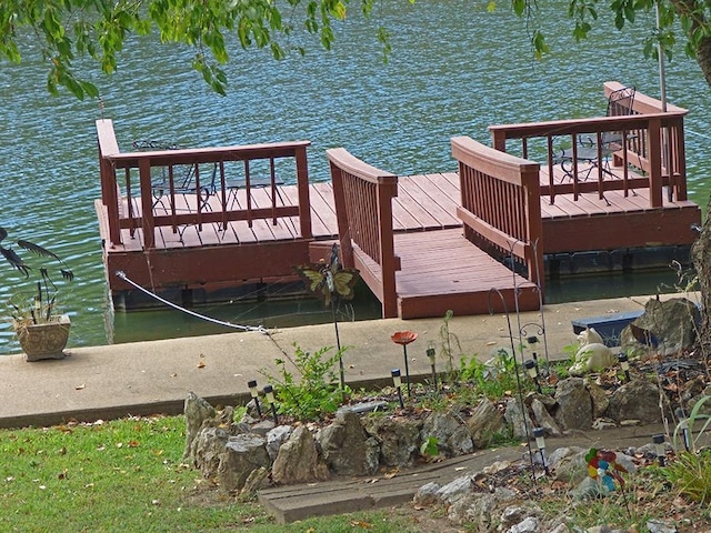 dock area featuring a water view