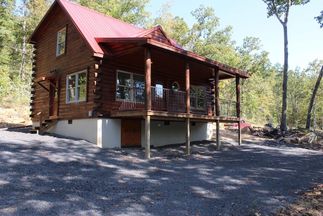 view of home's exterior featuring a deck