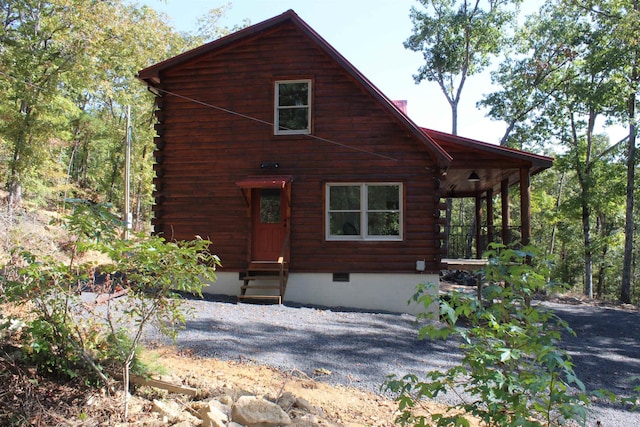 view of log-style house