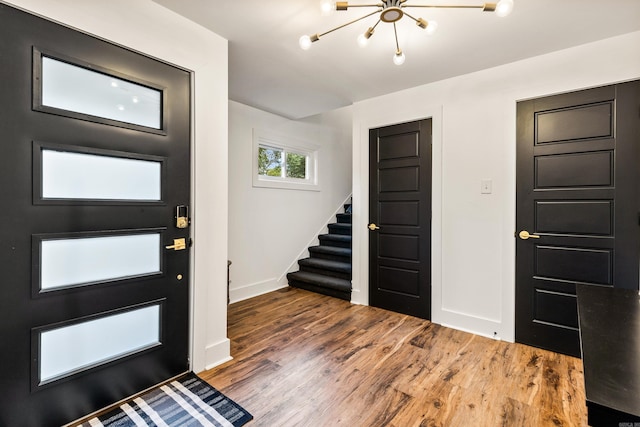 foyer entrance featuring hardwood / wood-style flooring