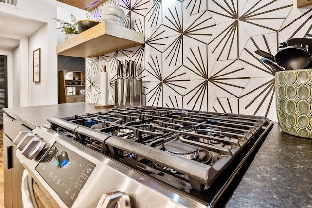 interior details with stainless steel range with gas stovetop