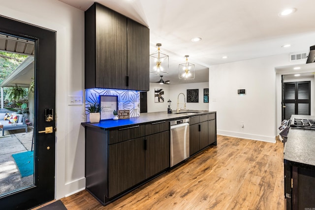 kitchen featuring dark brown cabinets, light wood-type flooring, dishwasher, and sink