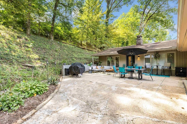 view of patio featuring outdoor lounge area and grilling area