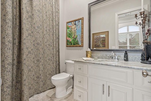 bathroom featuring crown molding, vanity, toilet, and a shower with curtain